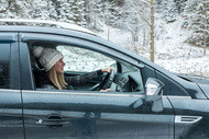 guide woman drive in snow guide woman drive in snow