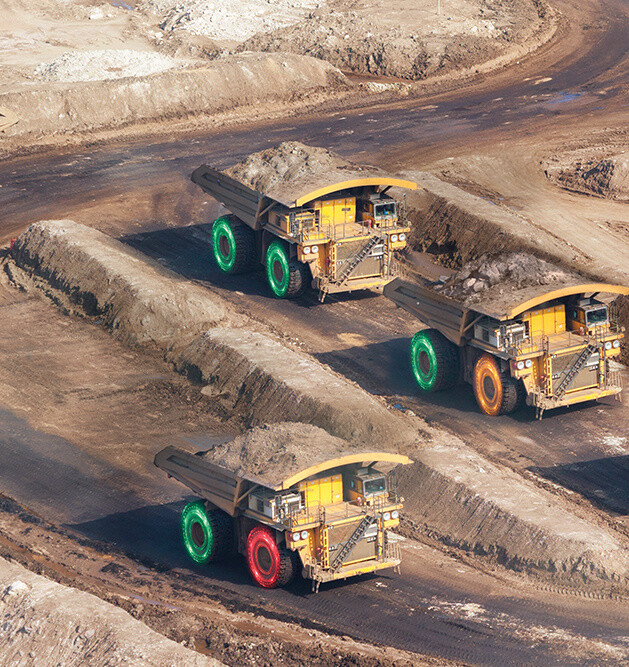 Three MEMS 4 vehicles at work in a quarry.
