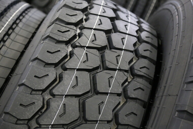 background new truck tyre at factory help and advice