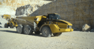Yellow articulated dump truck in action