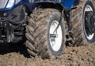 tractor equipped with central tire inflation system to ensure traction on mud and limit soil compaction