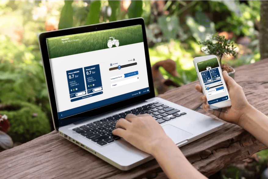 Michelin AgroPressure tool displayed on a laptop and mobile device