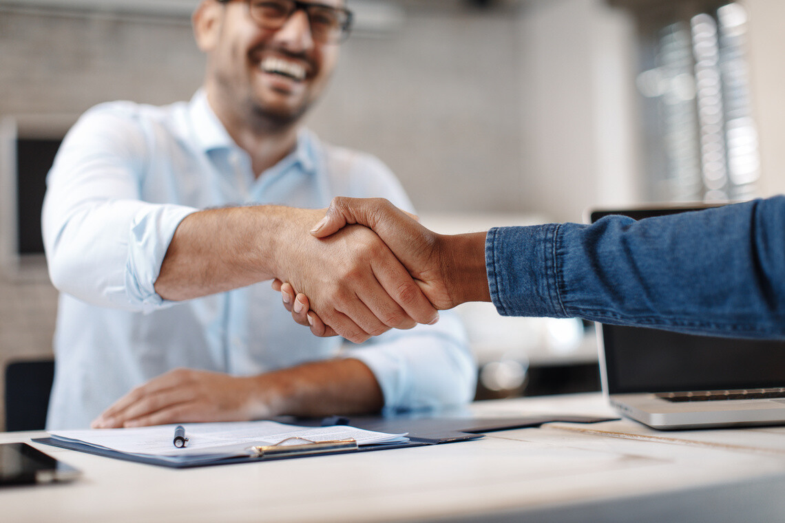 business people shaking hands