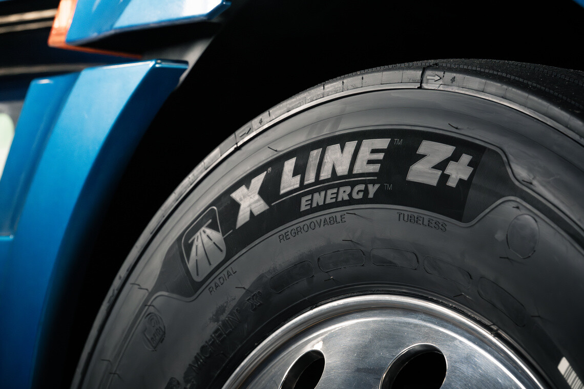 x line energy z+ tire with blue step of truck
