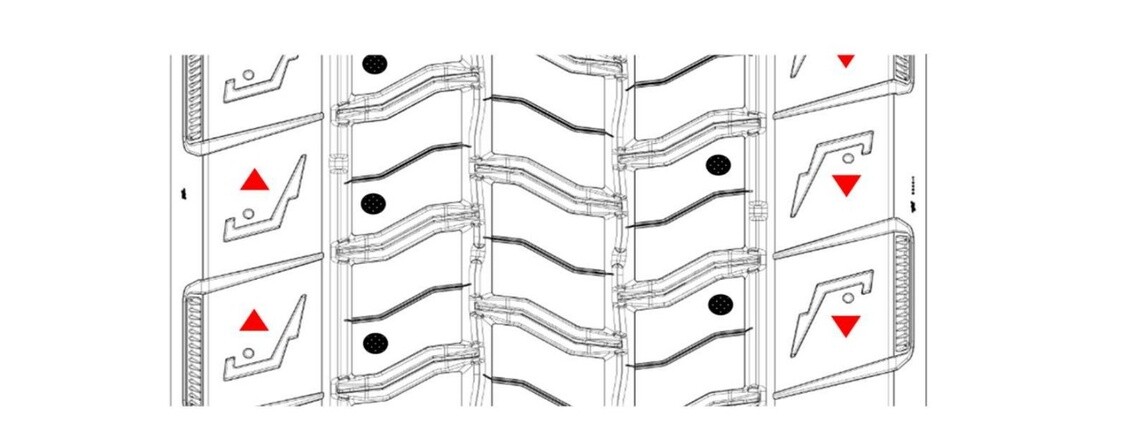 Diagram showing stud placement locations on a crane tire tread pattern