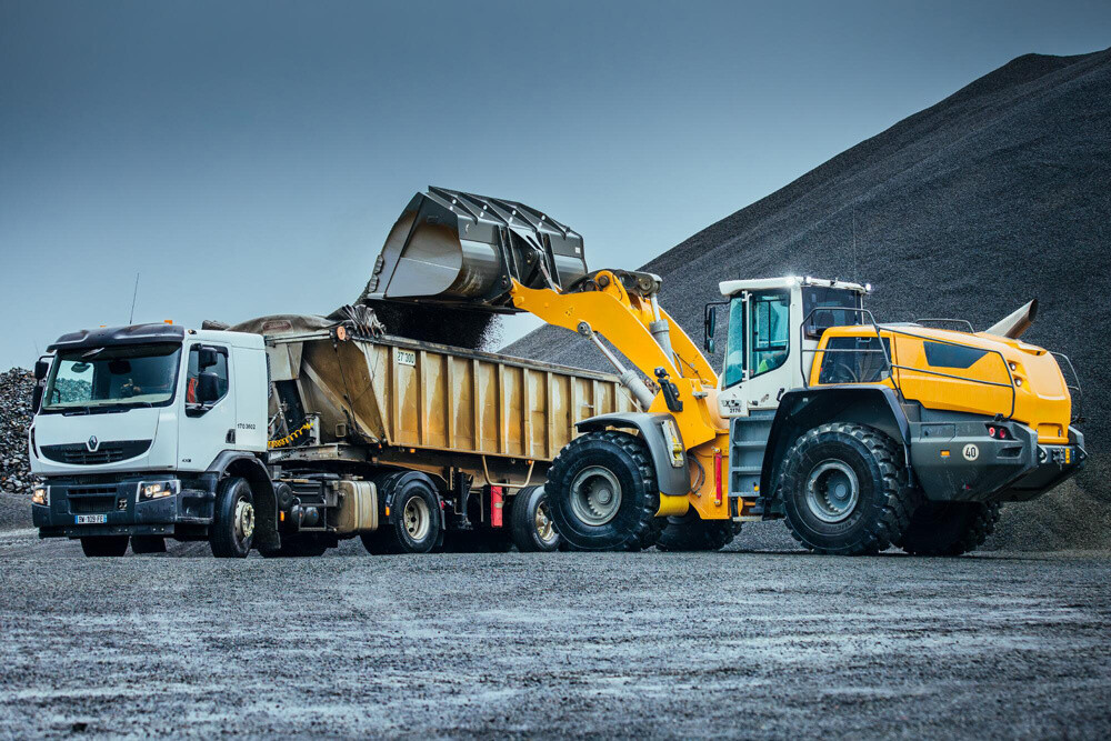 earthmoving vehicles: articulated dump truck and wheel loader