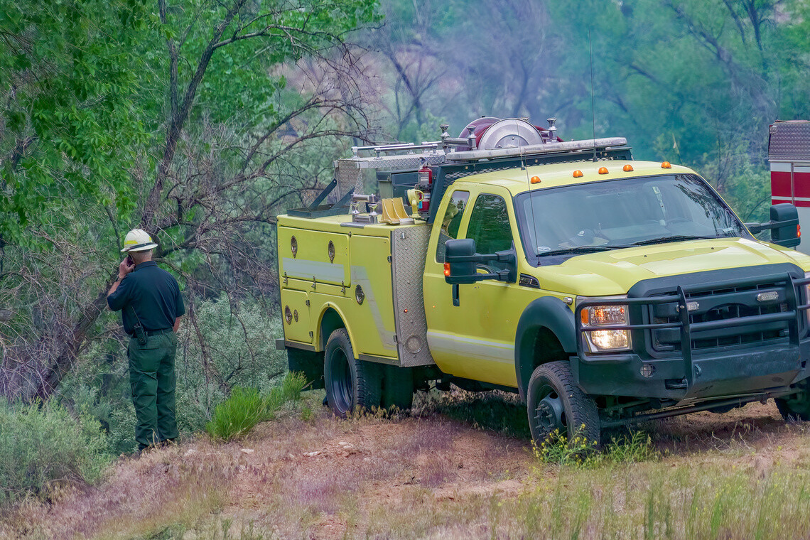 4wd fire truck in the brush ready to fight a fire