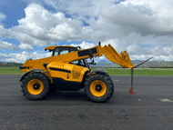 telescopic forklift on a road with Michelin tires