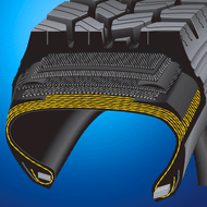 A cutout of a tire to show the radial pattern