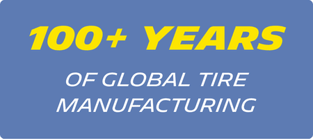 Blue box with 100+ years of global tire manufacturing in white and yellow