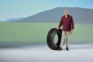 Managing Partner for a transportation company, Serio Minatelli stands with a Michelin X Multi tire