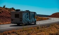 Recreational vehicle traveling on a highway
