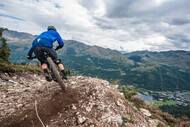 Mountain bike racing on rough ground