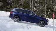 car in intersection on winter blue roads