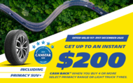Road inside the forest with cars fitted with Michelin Primacy SUV+ on the left hand side, Michelin Cash Back Promotion get up to $200 when you buy 4 or more Primacy Range and Light truck, Canstar award logo on the right hand side