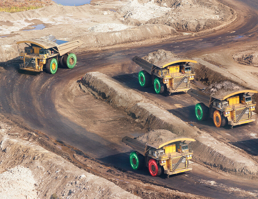 Three MEMS 4 vehicles at work in a quarry.