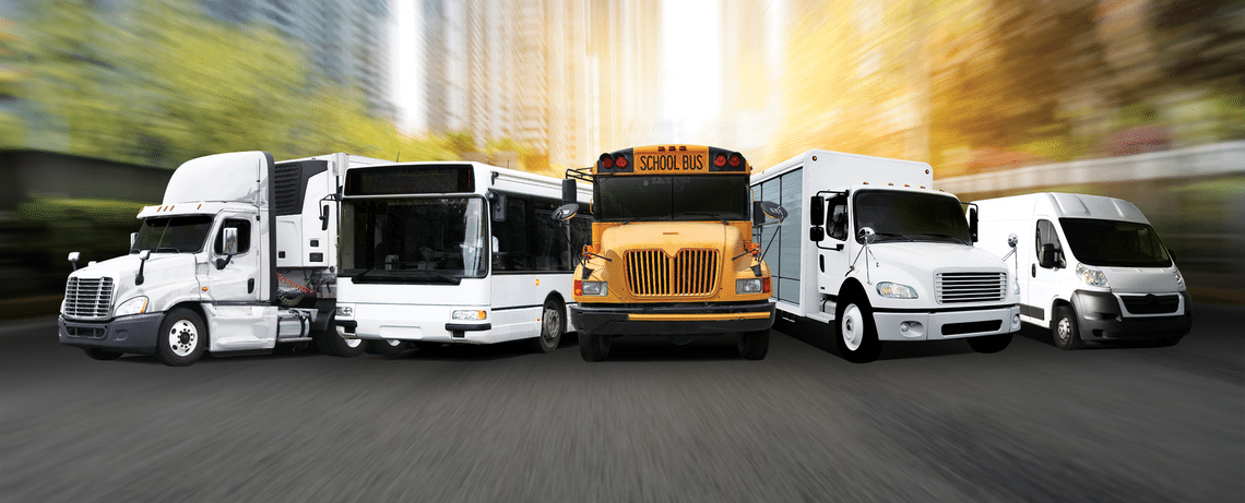 Image of school bus, city bus, tractor, refrig truck and van