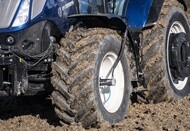 tractor equipped with central tire inflation system to ensure traction on mud and limit soil compaction